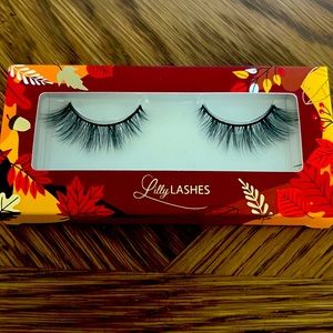 Black Lilly Lashes, never opened.